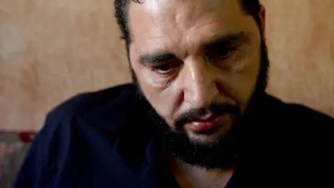 BBC/Goktay Koraltan Adnan Al Ezzeldin is the brother of Shaaban who was shot dead while shutting his business one night 