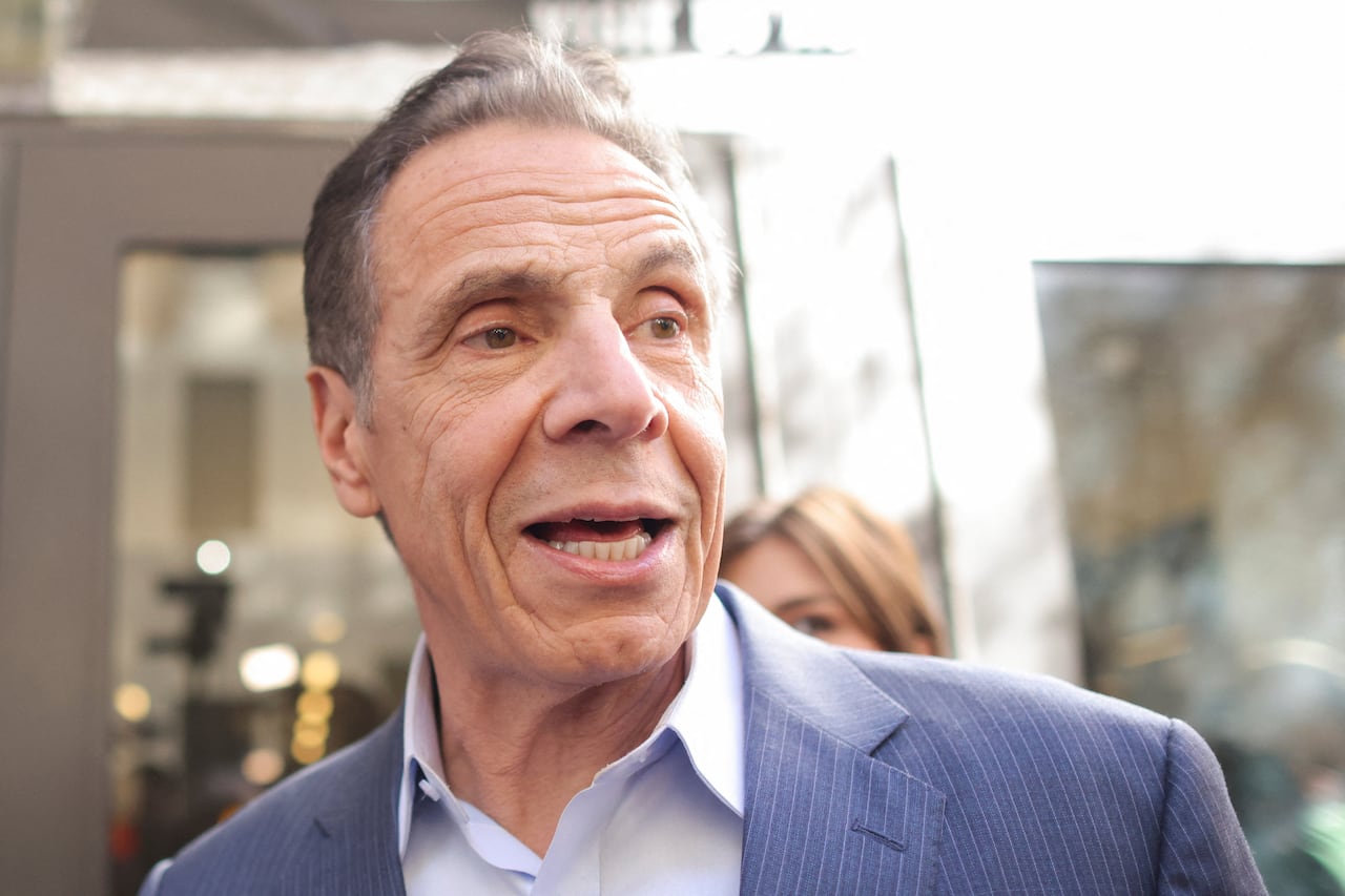 Man in light blue striped jacket 