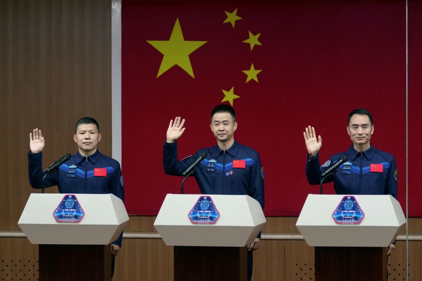 Astronauts Chen Dong, Chen Zhongrui and Wang Jie meet the press before their Shenzhou-20 spaceflight mission, at Jiuquan Satellite Launch Center in Gansu province, China, on April 23, 2025.