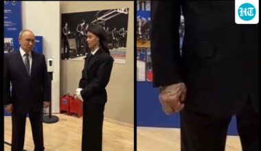 Vladimir Putin's 'swollen and sore' hand at public event sparks health rumours: 'His veins are bulging too'