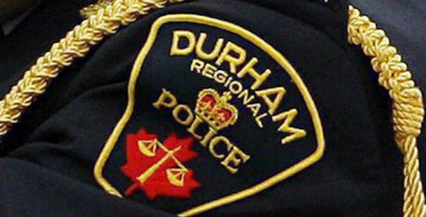 A Durham Regional Police Service logo is seen on a police uniform.