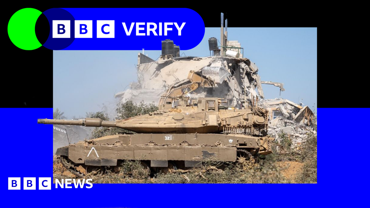 An Israeli tank parked in front of a heavily damaged building in Gaza. The image is imposed over BBC Verify branding and colours.