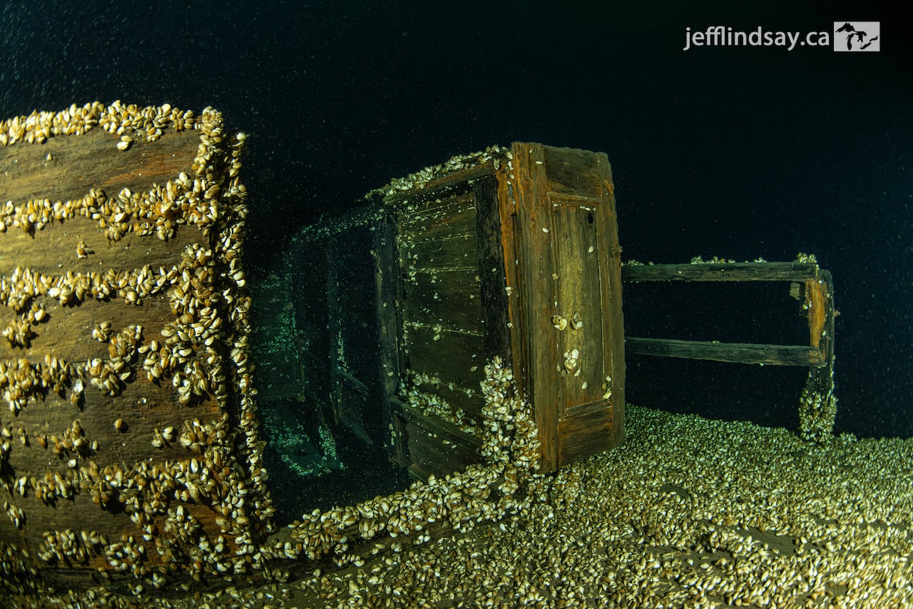 The deck cabin can be seen in this image, along with the companion way, poor door and railing. 