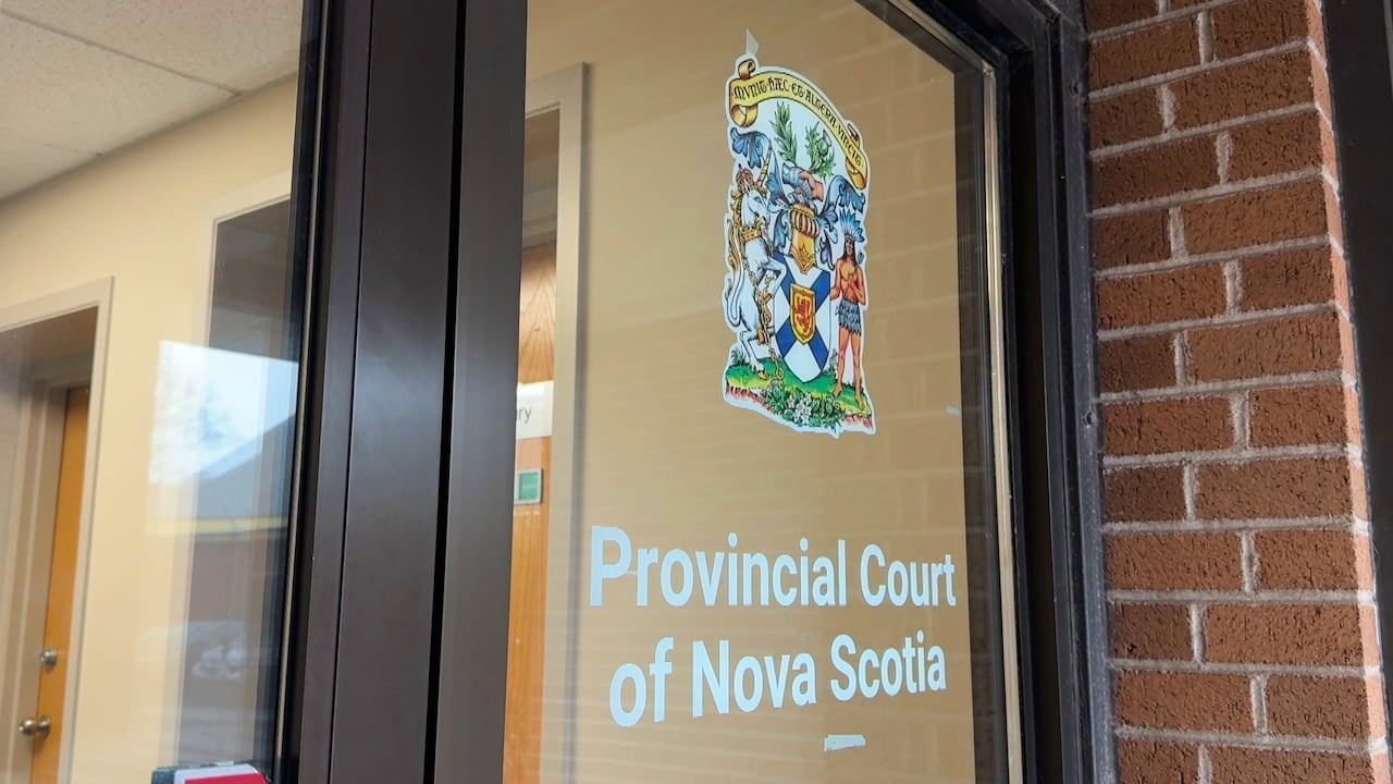 A sign on a door that says 'Nova Scotia provincial court' is shown.