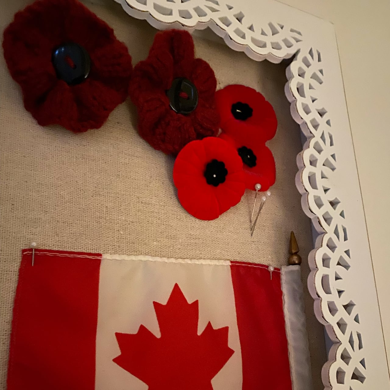 Canadian flag in a frame.