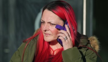 Woman charged over threats made against Simon Harris