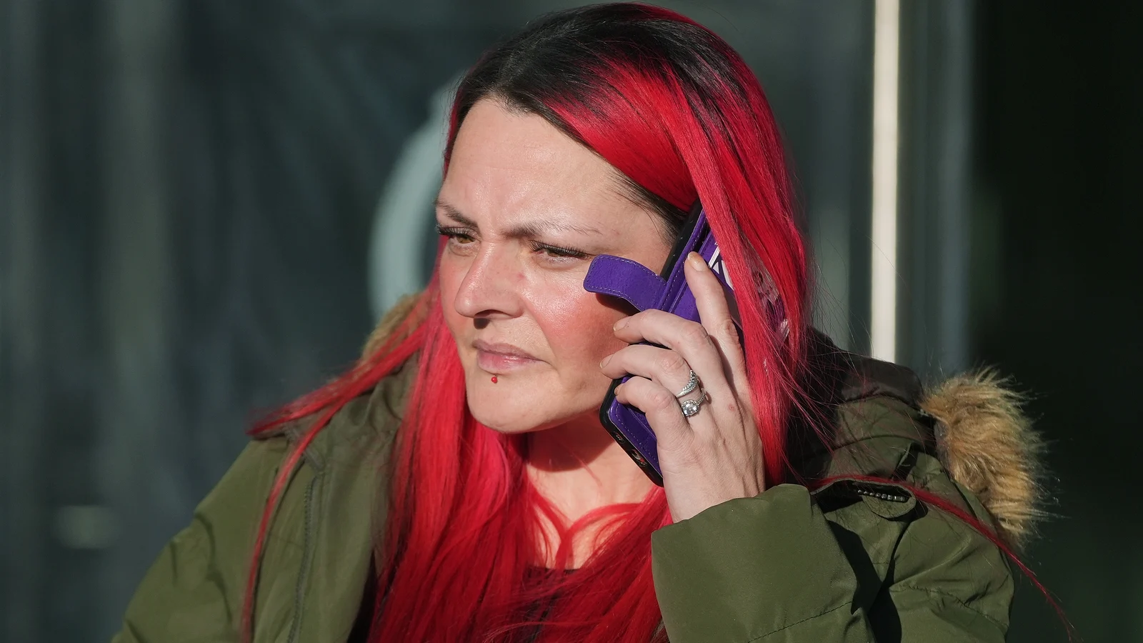 Woman charged over threats made against Simon Harris