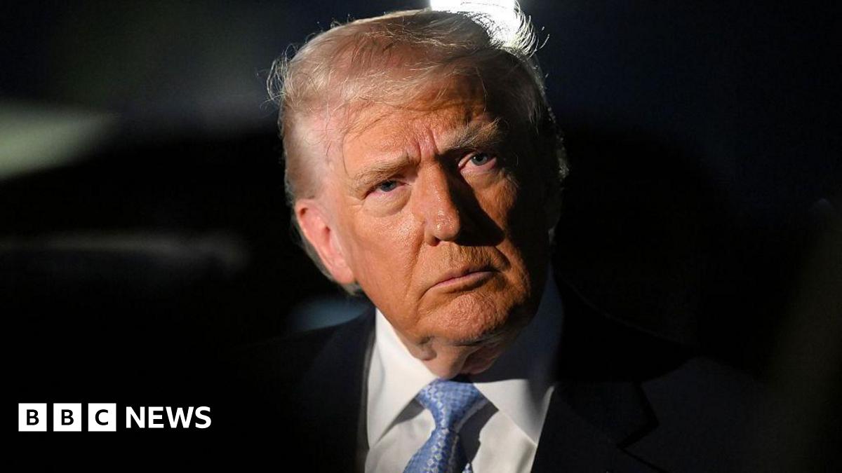 Donald Trump stares straight ahead