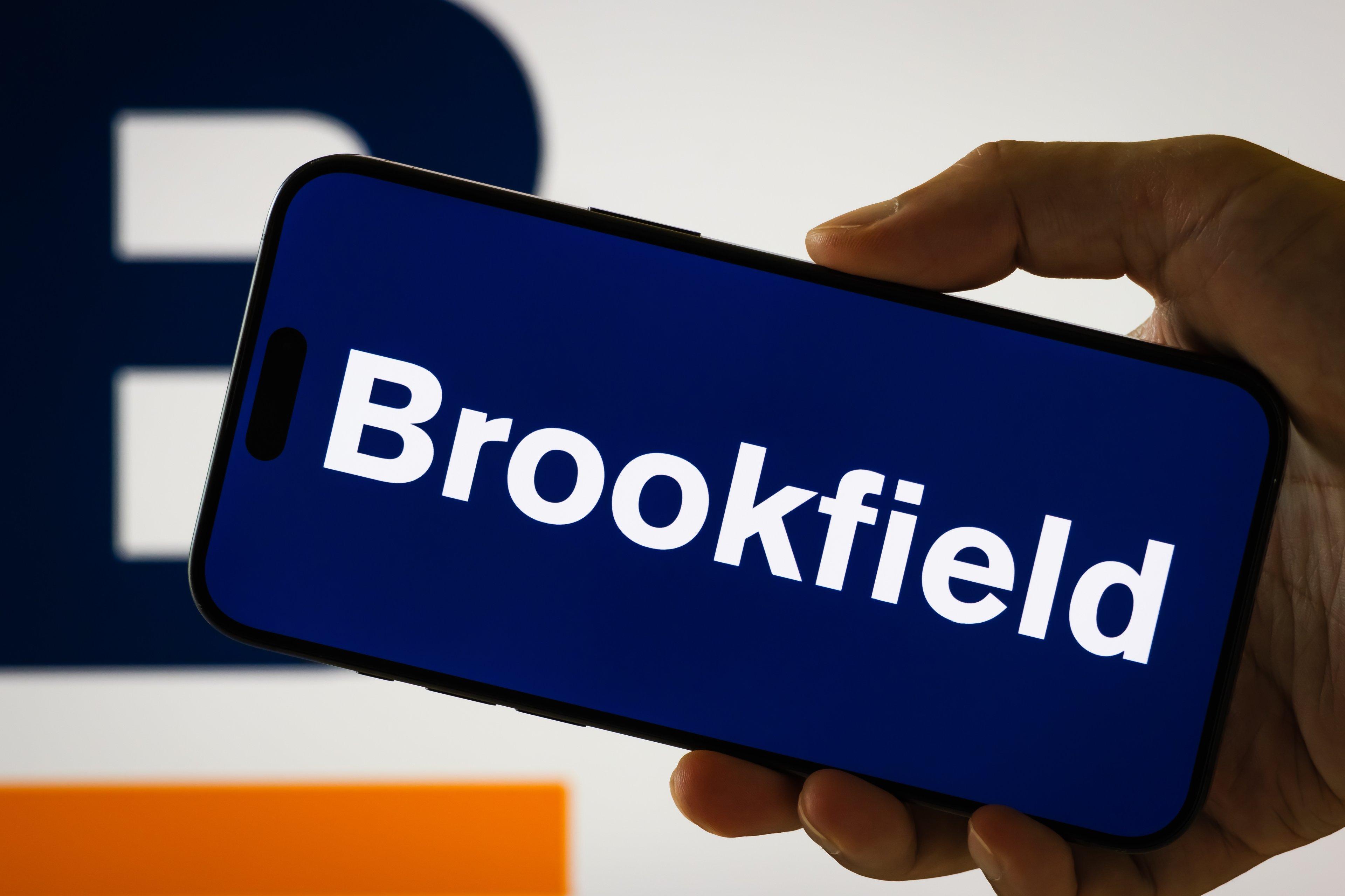 Brookfield's logo on a mobile phone.