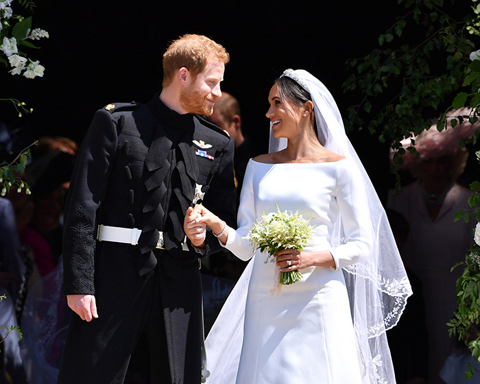 Prince Harry and Meghan Markle on their wedding day, with Prince Philip reportedly warning Harry of being bamboozled.