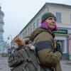 Combat medic Olena Ivanenko, 44, takes a break from the frontline in the northern city of Sumy earlier this year.