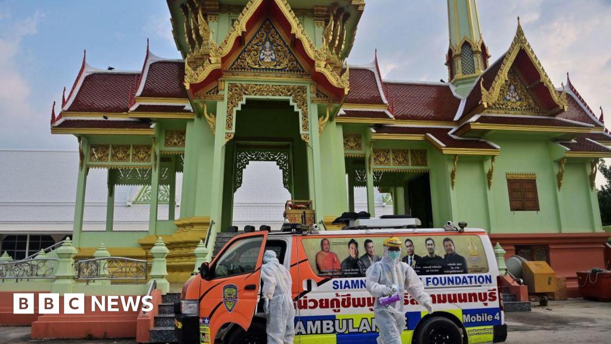 Rescue volunteers from the Siam Nonthaburi foundation prepare for the funerals of people who died after contracting the Covid-19 coronavirus at Wat Rat Prakhong Tham Buddhist temple in Nonthaburi on May 5, 2021.