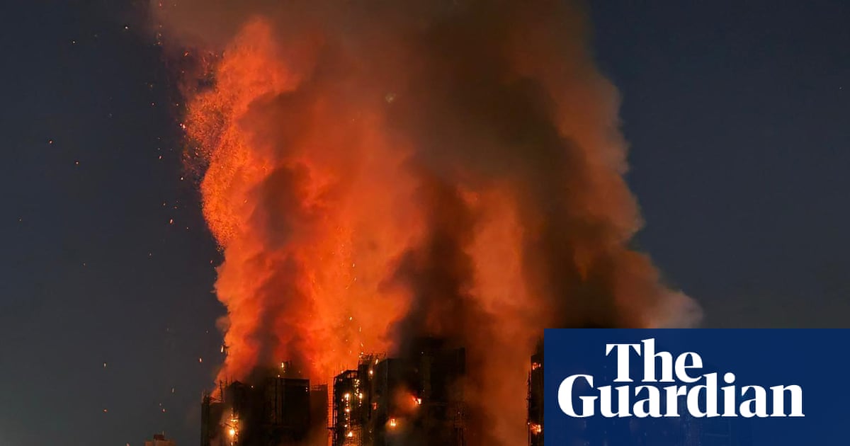 Four dead after fire engulfs residential high-rise buildings in Hong Kong | Hong Kong