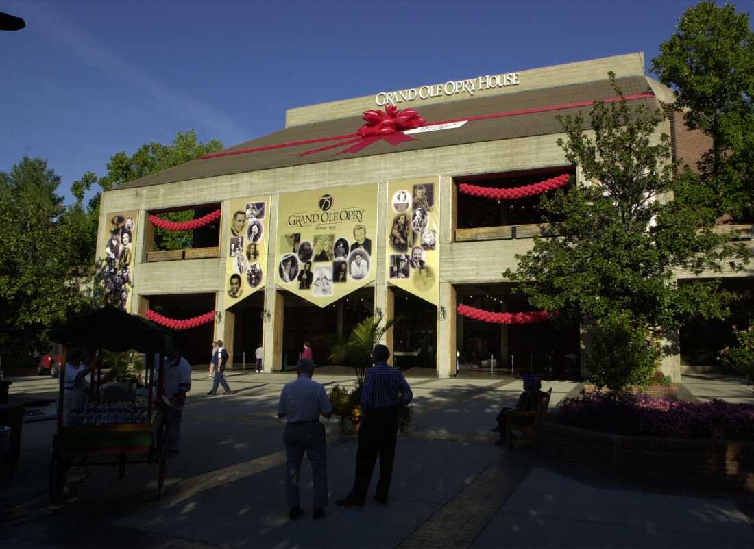 In 1974, the Opry moved from the Ryman Theater to The Grand Ole Opry House in Nashville, Tenn. Shown here in 2000, during a celebration for the venue's 75th birthday, it was originally located within a theme park called Opryland USA. Today it is adjacent to Opry Mills, a shopping mall.