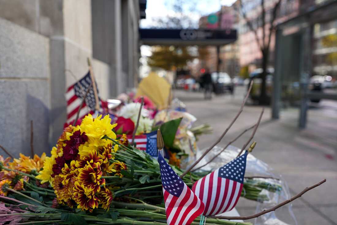 A makeshift memorial of flowers and American flags stands outside the Farragut West Metro station on Nov. 28, 2025 in Washington, DC.