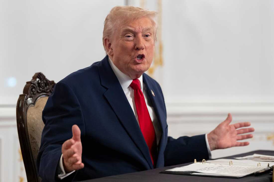 President Trump speaks to reporters after speaking to troops via video from his Mar-a-Lago estate on Thanksgiving, Thursday, Nov. 27, 2025, in Palm Beach, Fla. 