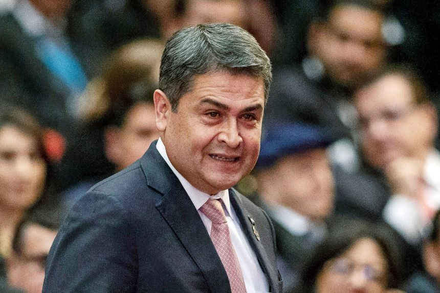 Juan Orlando Hernandez arrives for the swearing-in ceremony for Guatemala's new president in Guatemala City on January 14, 2020.