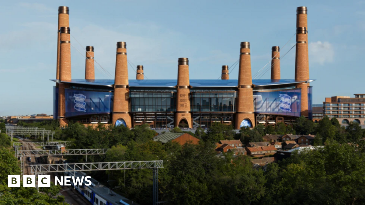An artist impression of the new stadium. There are several what look like chimneys around the circular ground with the club's blue insignia in each section.