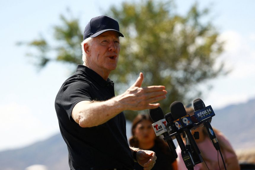 Sen. John Cornyn speaks with the press after he visited an ICE detention facility being built to house migrants at Fort Bliss in El Paso, Texas, in August.