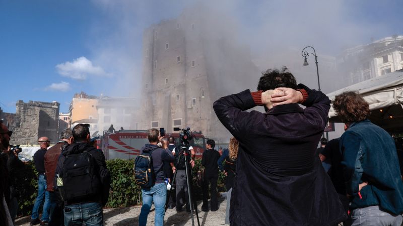 Medieval tower partially collapses in Rome, badly injuring one worker and trapping another