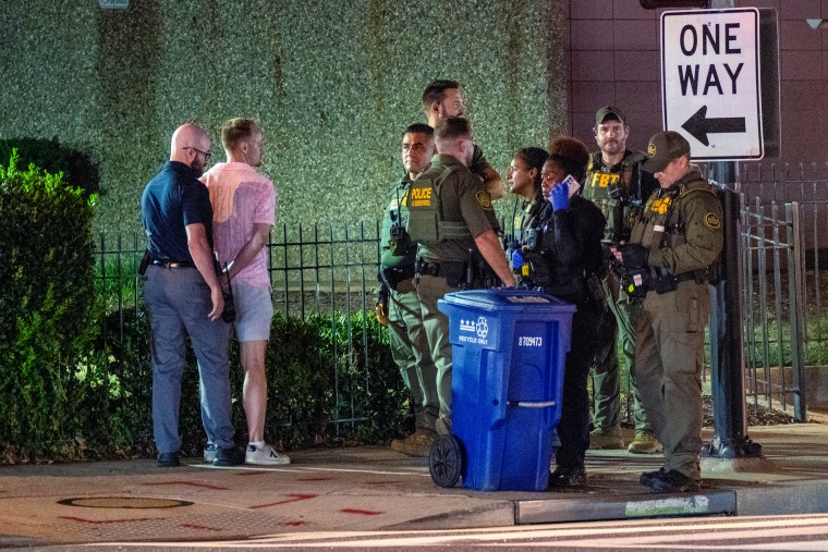 FBI and Border Patrol officers arrest Sean Charles Dunn.