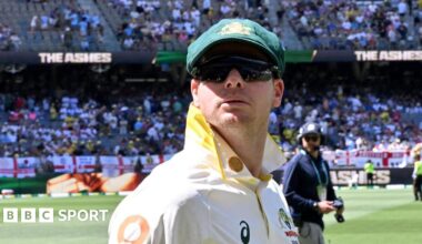 Steve Smith looks on