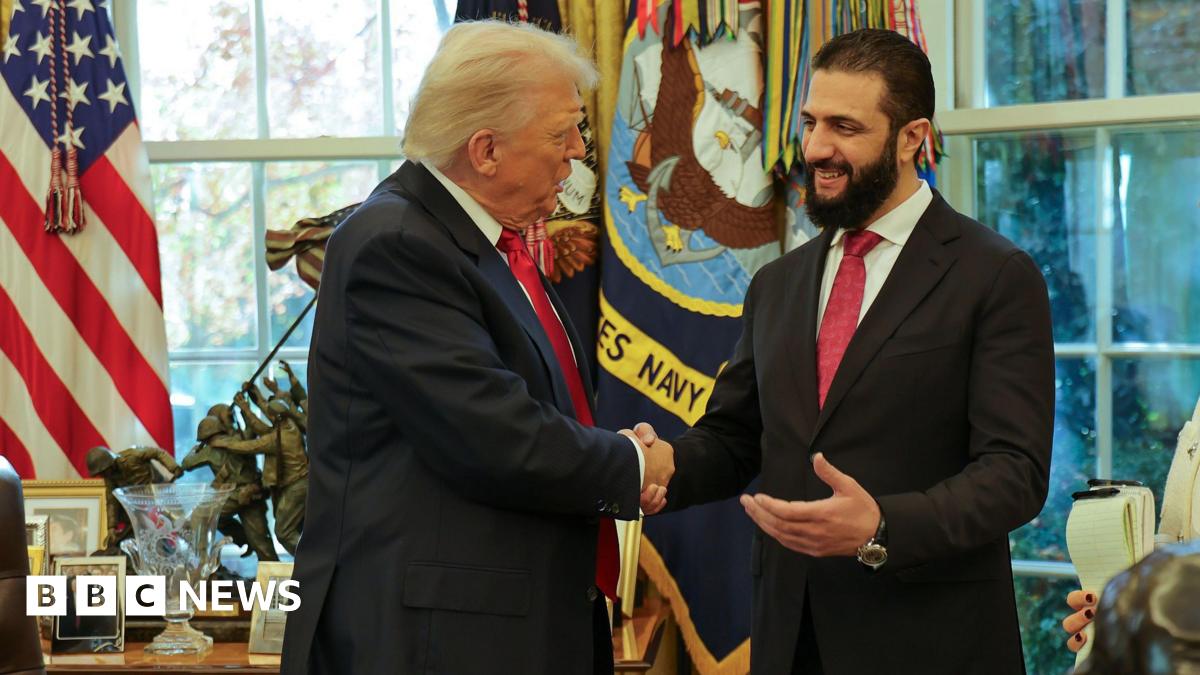Donald Trump, left, wears a navy suit and red tie and is seen shaking hands with Syria's President Ahmad al-Sharaa.