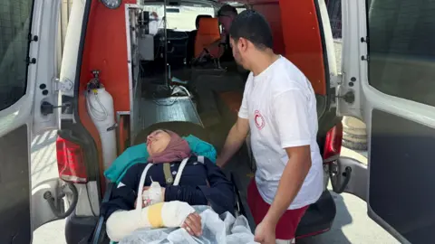 Reuters Reuters photographer Raneen Sawafta arrives at a hospital following an Israeli settlers attack near Nablus in the occupied West Bank (8 November 2025)