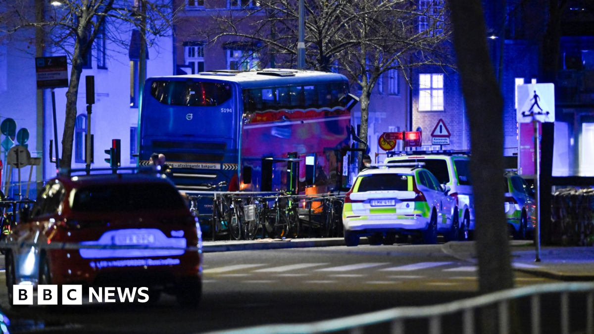 Police, ambulances, and emergency services inspect the scene of a bus crash into a bus shelter in Ostermalm, Stockholm, Sweden, 14 November 2025.