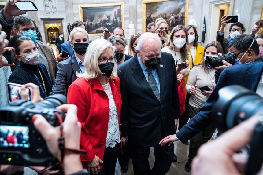 Cheney walks with his daughter Rep. Liz Cheney through the Capitol on January 6, 2022, the one year anniversary of the Capitol insurrection.