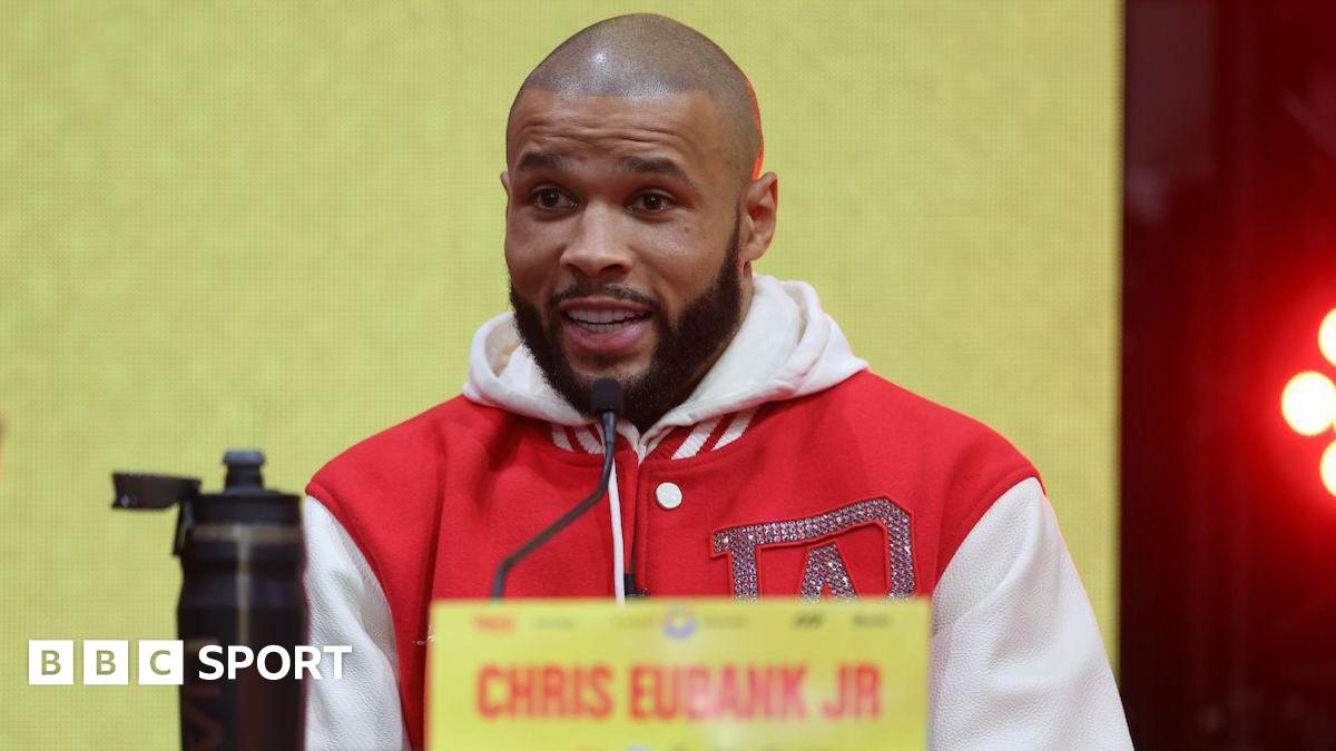 Chris Eubank Jr wearing a red jacket with white sleeves