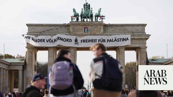 Pro-Palestinian activists use lift to scale Berlin’s Brandenburg Gate