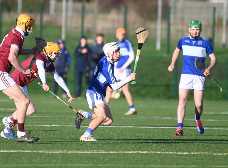  Evan Mac Eochán in possession for Gaelcholáiste Mhuire. Picture: Larry Cummins