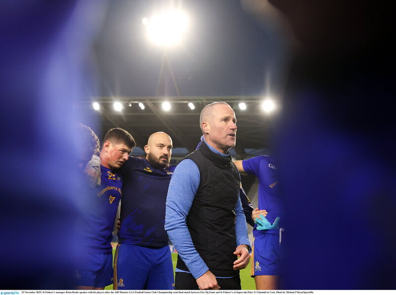 St Finbarr's manager Brian Roche speaks with his players after defeating Éire Óg of Ennis. Picture: Michael P Ryan/Sportsfile