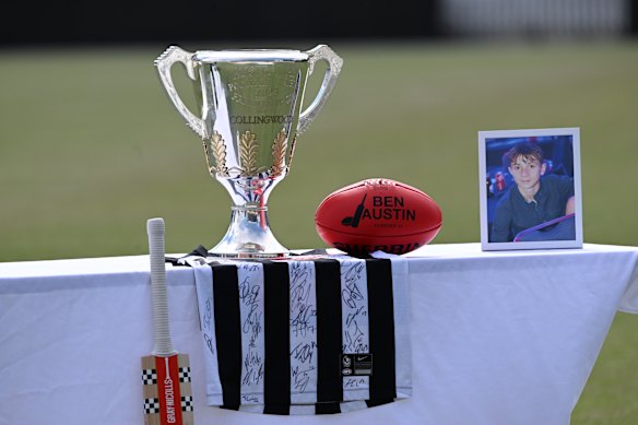 The Collingwood Magpies 2023 premiership cup, loaned to the Austin family for Ben’s funeral. 