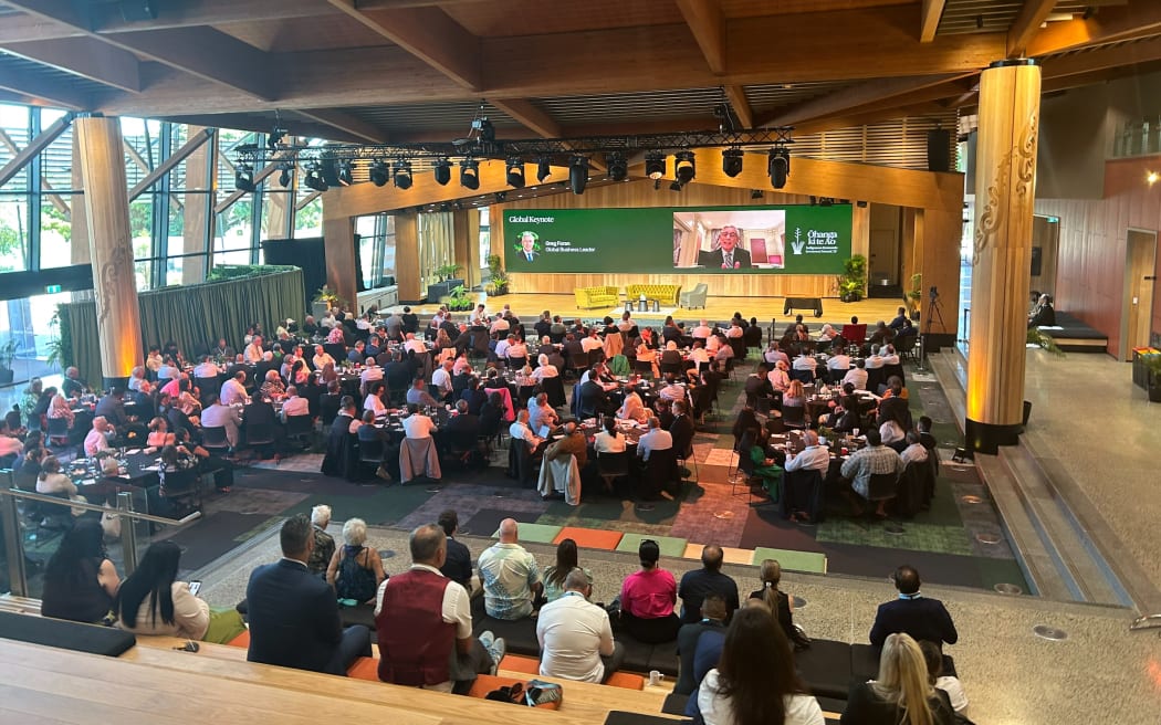 Summit delegates meet inside Te Pā at Waikato University.