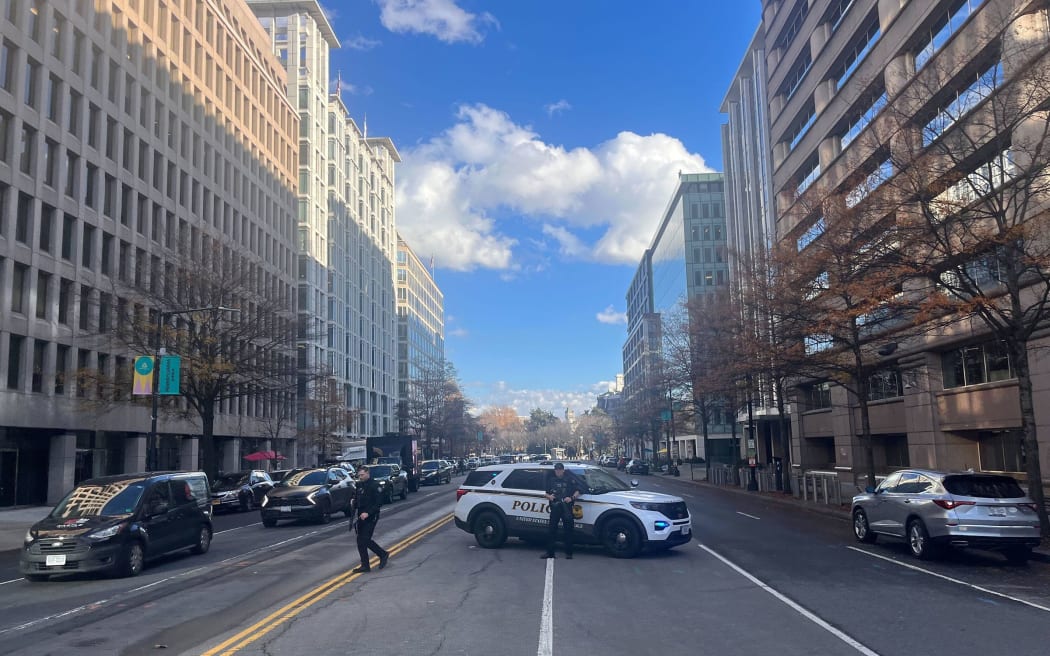 A police car blocks a street in Washington, DC, following a shooting on November 26.