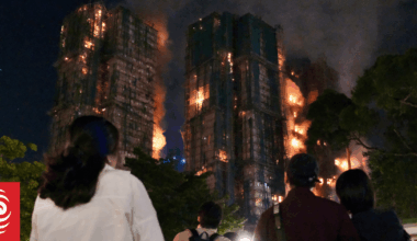 Fire engulfs Hong Kong residential buildings, killing dozens, trapping others