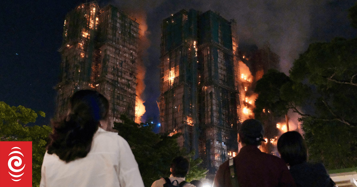 Fire engulfs Hong Kong residential buildings, killing dozens, trapping others