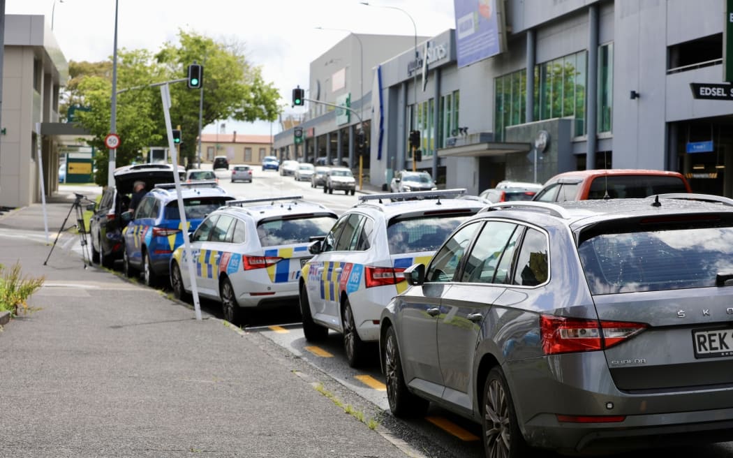 Police have cordoned off an area on Henderson's Edsel Street after a man was located with serious injuries on 26 November 2025. Police are on scene trying to find the offender.