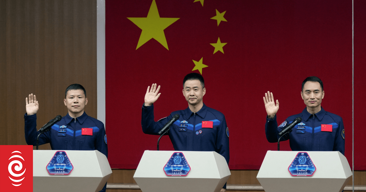 Chinese astronauts arrive home after suspected debris strike delays return to Earth