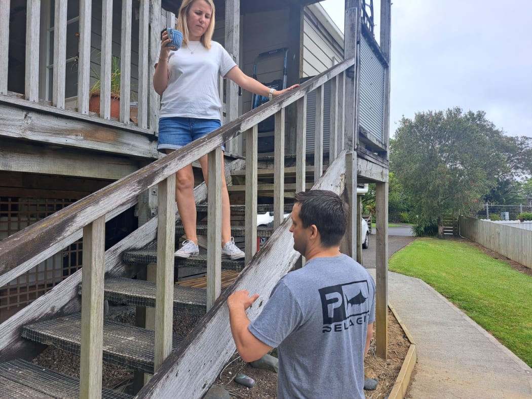Brendon and Stephanie Deacon at their property that was considered category one by Auckland Council despite their neighbours all being category three following flooding.
