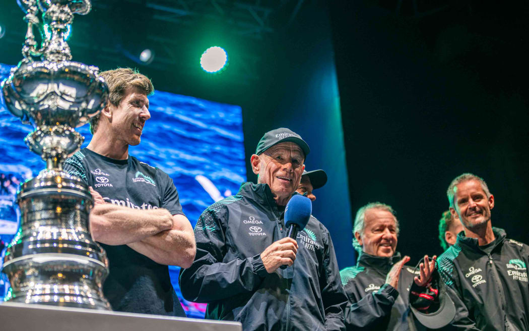 Peter Burling, left, and Grant Dalton celebrate Team New Zealand's America's Cup win.