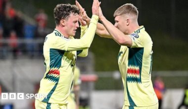 Nathan Broahead and Jordan James of Wales celebrate a goal against Liechtenstein.