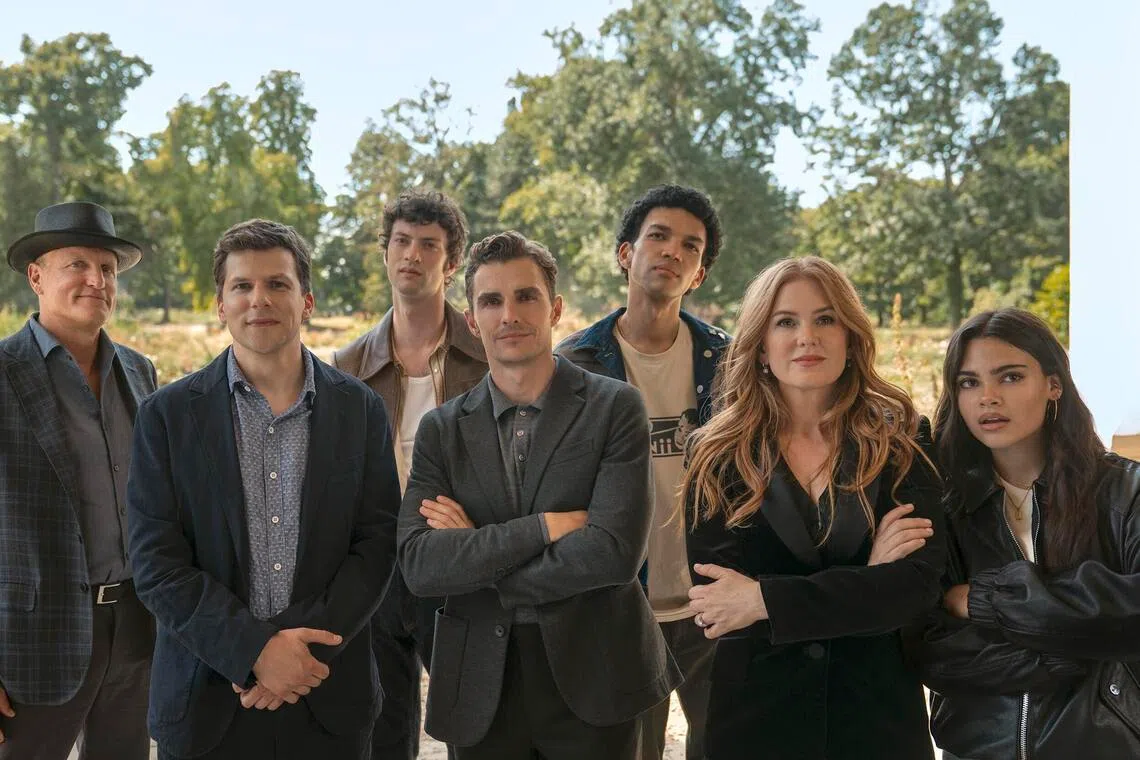 (From left) Woody Harrelson, Jesse Eisenberg, Dominic Sessa, Dave Franco, Justice Smith, Isla Fisher and Ariana Greenblatt in Now You See Me: Now You Don't.
