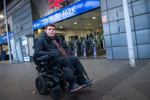 BBC Alex Taylor outside Finsbury Park underground station
