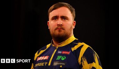 Luke Littler looks pensive during a break in play at the Players Championship Finals in Minehead