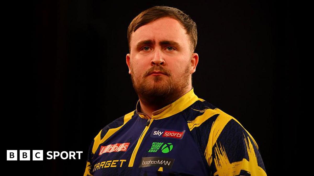Luke Littler looks pensive during a break in play at the Players Championship Finals in Minehead