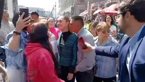 Man appears to grope Claudia Sheinbaum in Mexico City street – video