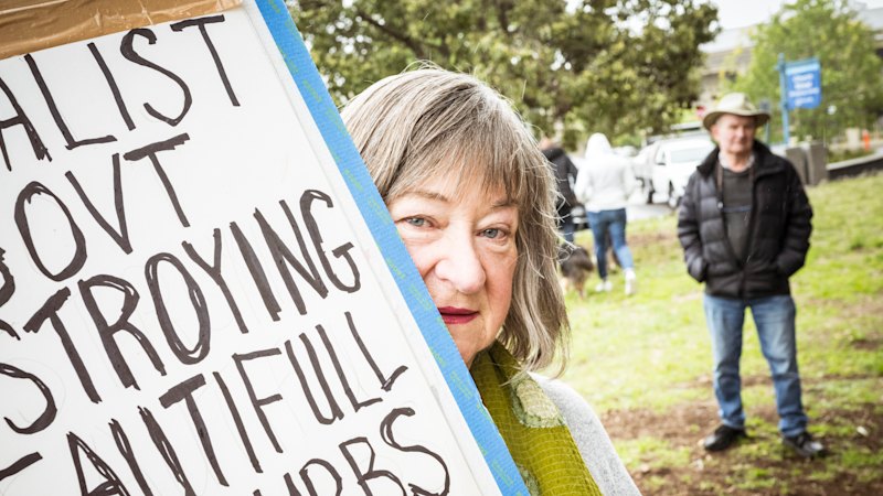 Residents rally against high-rise development plans